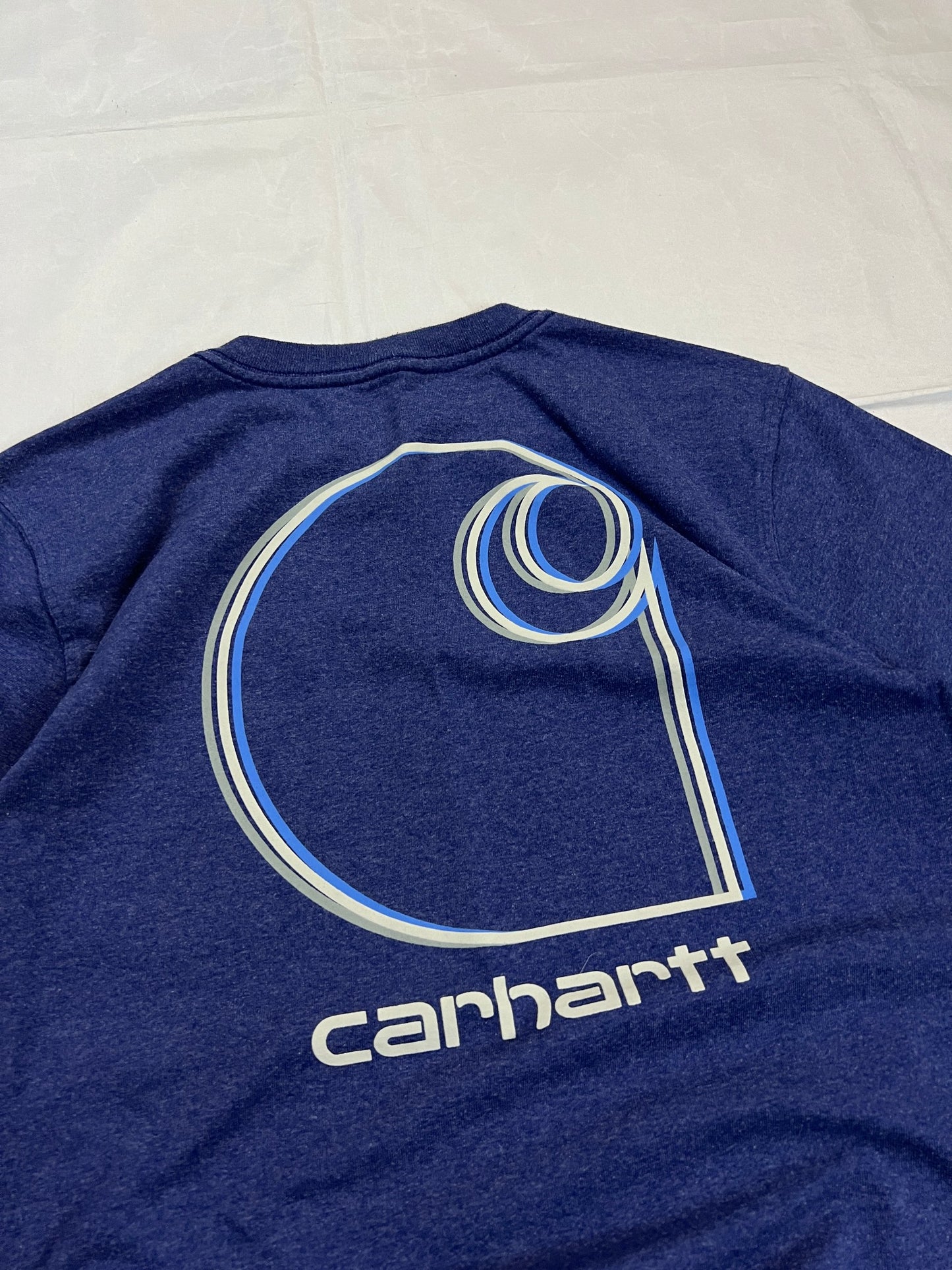 Carhartt navy blue t-shirt with front pocket logo and large back logo design.