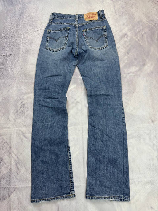 Levi's blue denim jeans with classic five-pocket design and iconic patch on waistband.