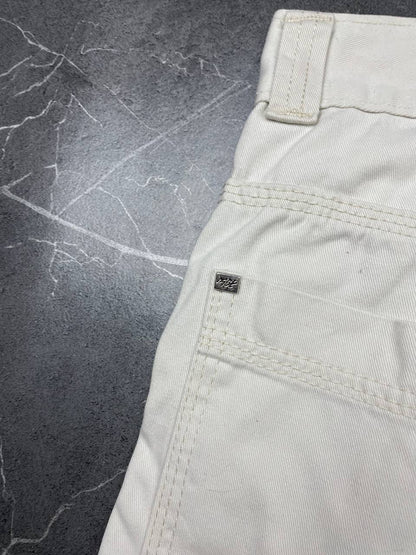 FUBU white cargo shorts 100% cotton with multiple pockets and detailed branding.