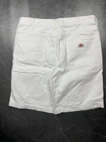 Dickies white cotton work shorts with logo on back pocket and waistband label.