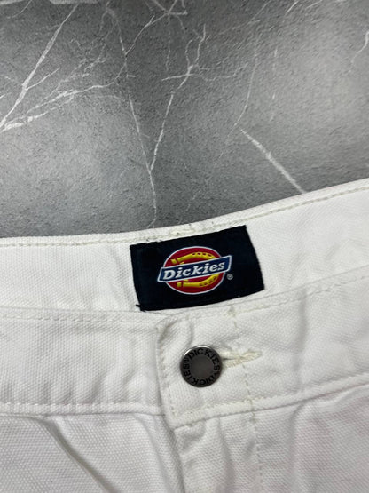 Dickies white cotton work shorts with logo on back pocket and waistband label.