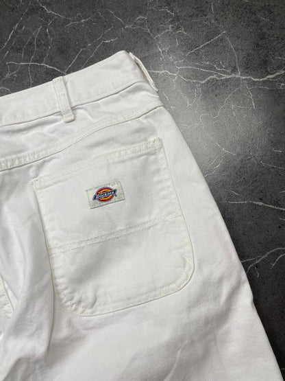 Dickies white cotton work shorts with logo on back pocket and waistband label.