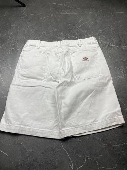Dickies white cotton work shorts with logo on back pocket and waistband label.