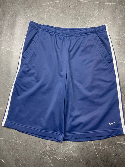 Nike blue sports shorts with white side stripes and small swoosh logo, zip pocket.