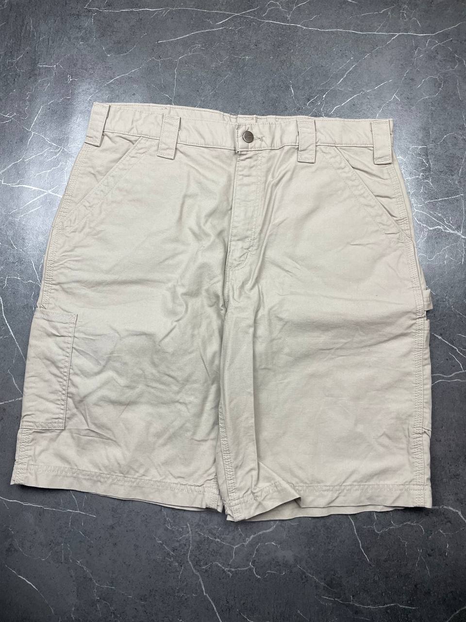Carhartt beige work shorts 36-inch waist with multiple pockets and hammer loop detail.