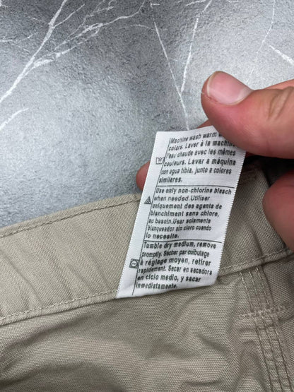 Carhartt beige work shorts 36-inch waist with multiple pockets and hammer loop detail.