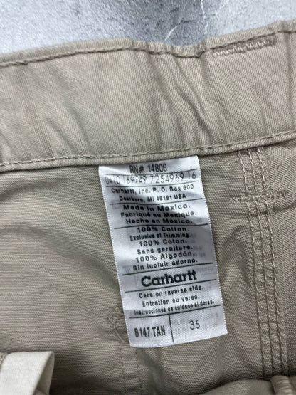 Carhartt beige work shorts 36-inch waist with multiple pockets and hammer loop detail.