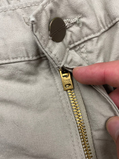 Carhartt beige work shorts 36-inch waist with multiple pockets and hammer loop detail.