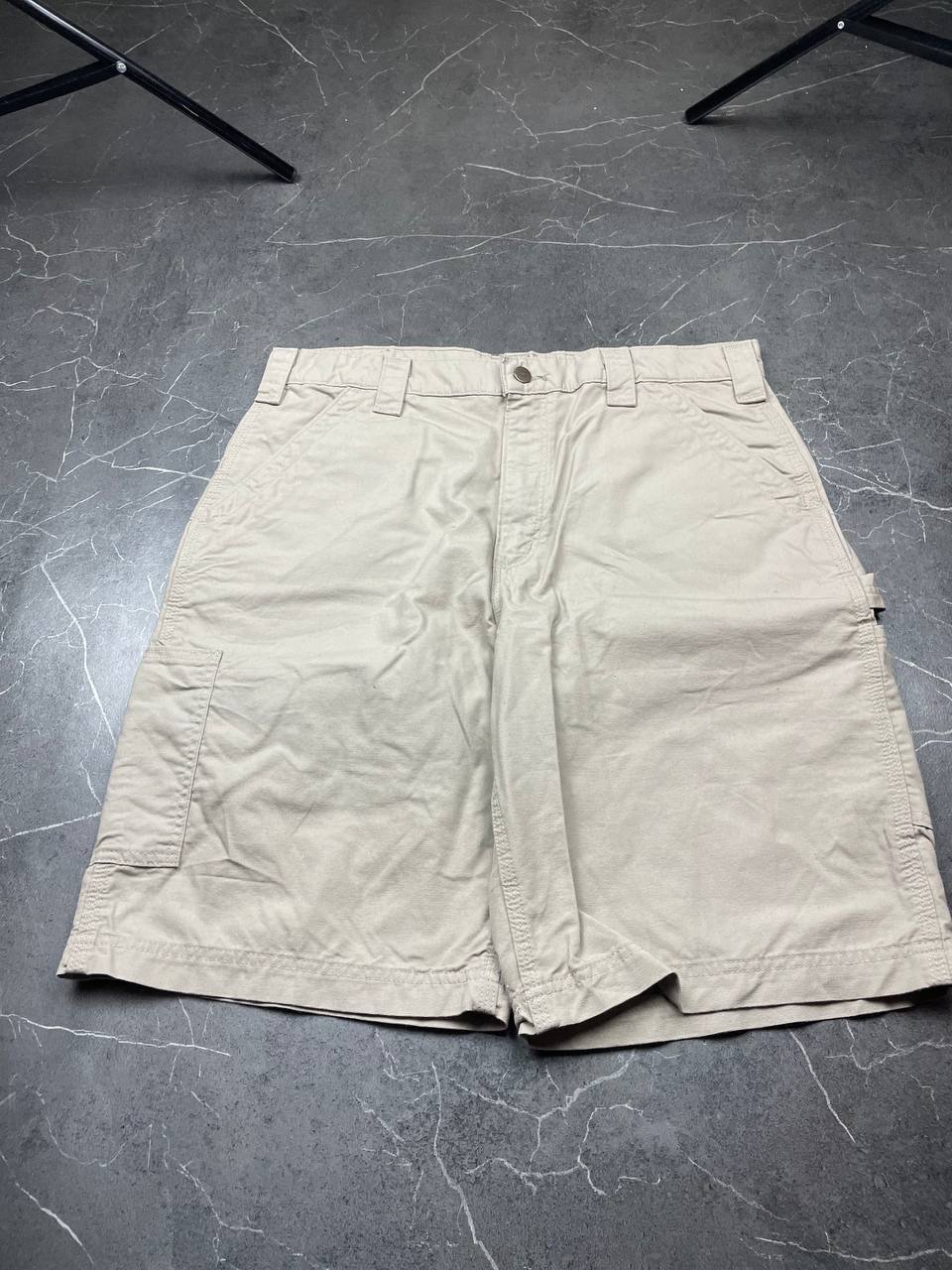 Carhartt beige work shorts 36-inch waist with multiple pockets and hammer loop detail.