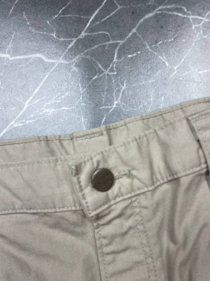 Carhartt beige work shorts 36-inch waist with multiple pockets and hammer loop detail.