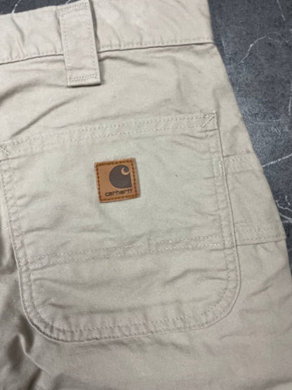 Carhartt beige work shorts 36-inch waist with multiple pockets and hammer loop detail.