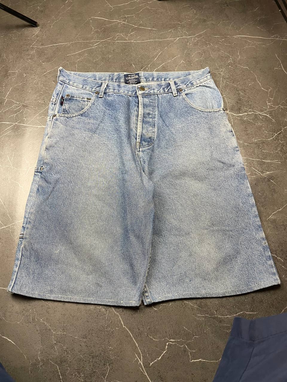 NASA Clothing light blue denim shorts with embroidered logo and classic 5-pocket styling.