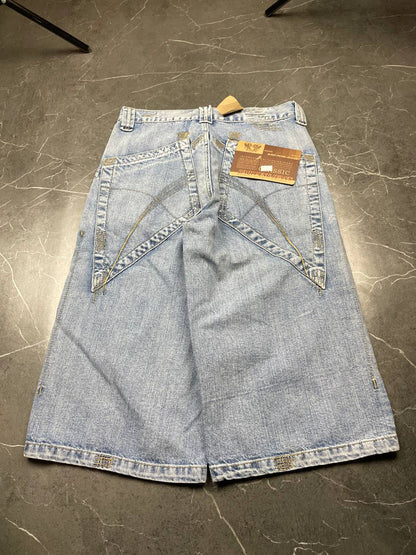 DAQIPENG light blue denim skirt with contrasting black stitching and vintage patch detail.