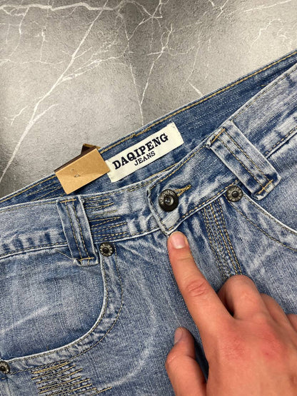 DAQIPENG light blue denim skirt with contrasting black stitching and vintage patch detail.