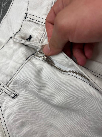 Carhartt white shorts with contrasting black stitching and classic logo patch.