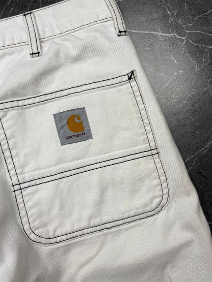 Carhartt white shorts with contrasting black stitching and classic logo patch.