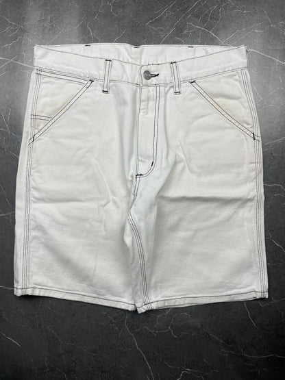 Carhartt white shorts with contrasting black stitching and classic logo patch.