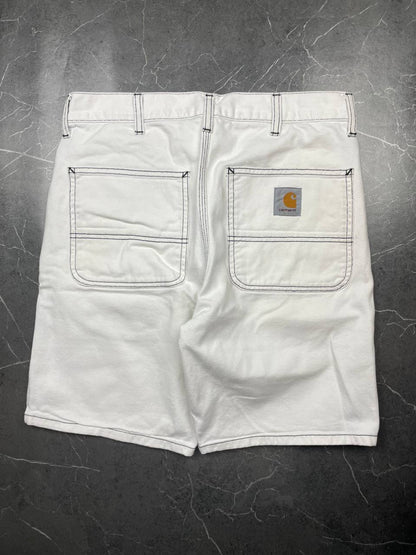 Carhartt white shorts with contrasting black stitching and classic logo patch.