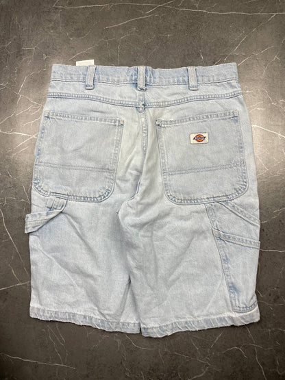 Dickies light blue denim carpenter shorts with logo button, multiple pockets, and hammer loop.