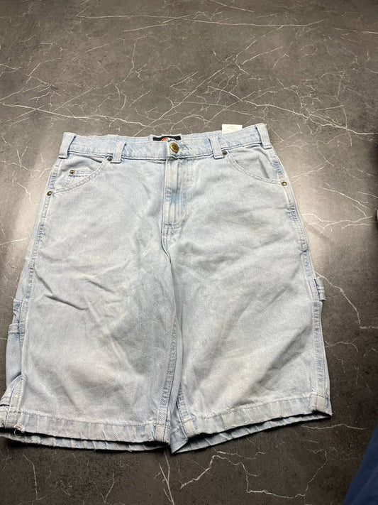Dickies light blue denim carpenter shorts with logo button, multiple pockets, and hammer loop.