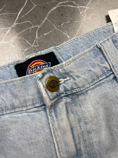 Dickies light blue denim carpenter shorts with logo button, multiple pockets, and hammer loop.