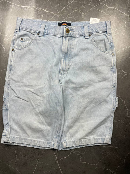 Dickies light blue denim carpenter shorts with logo button, multiple pockets, and hammer loop.