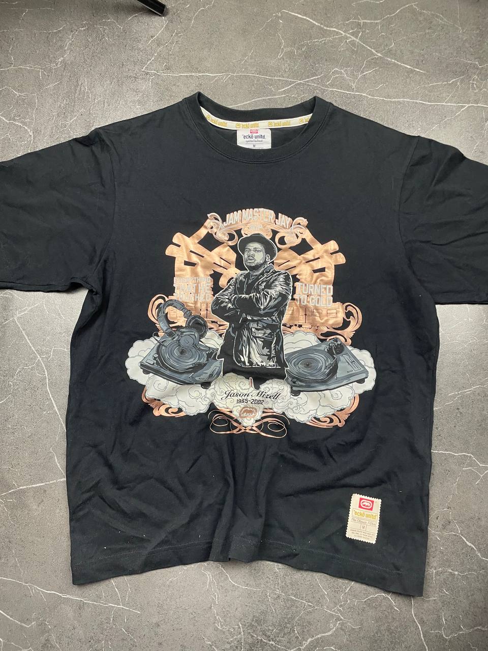 Ecko Unltd black graphic t-shirt featuring Jam Master Jay tribute and embroidered logo tab.