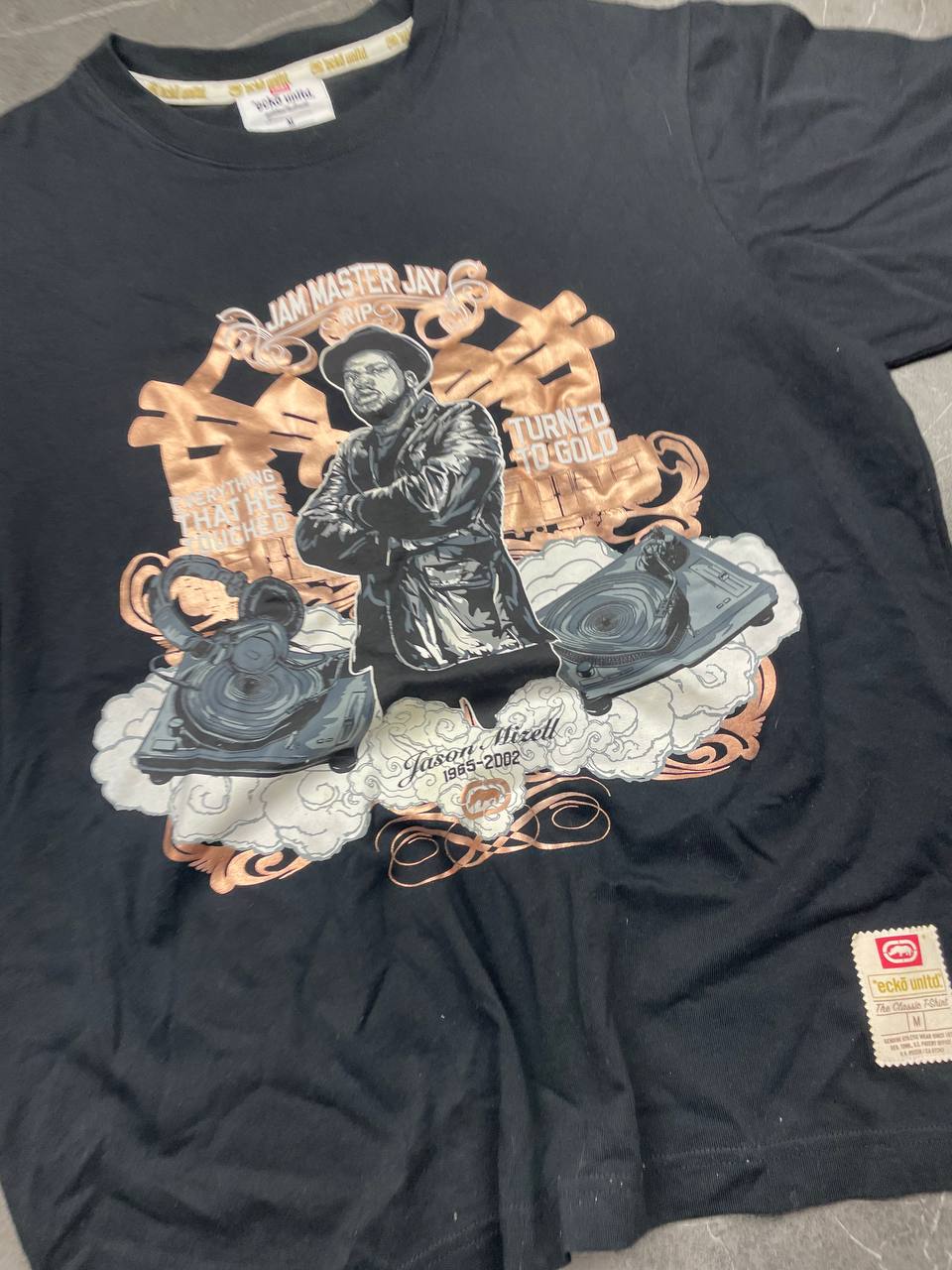 Ecko Unltd black graphic t-shirt featuring Jam Master Jay tribute and embroidered logo tab.