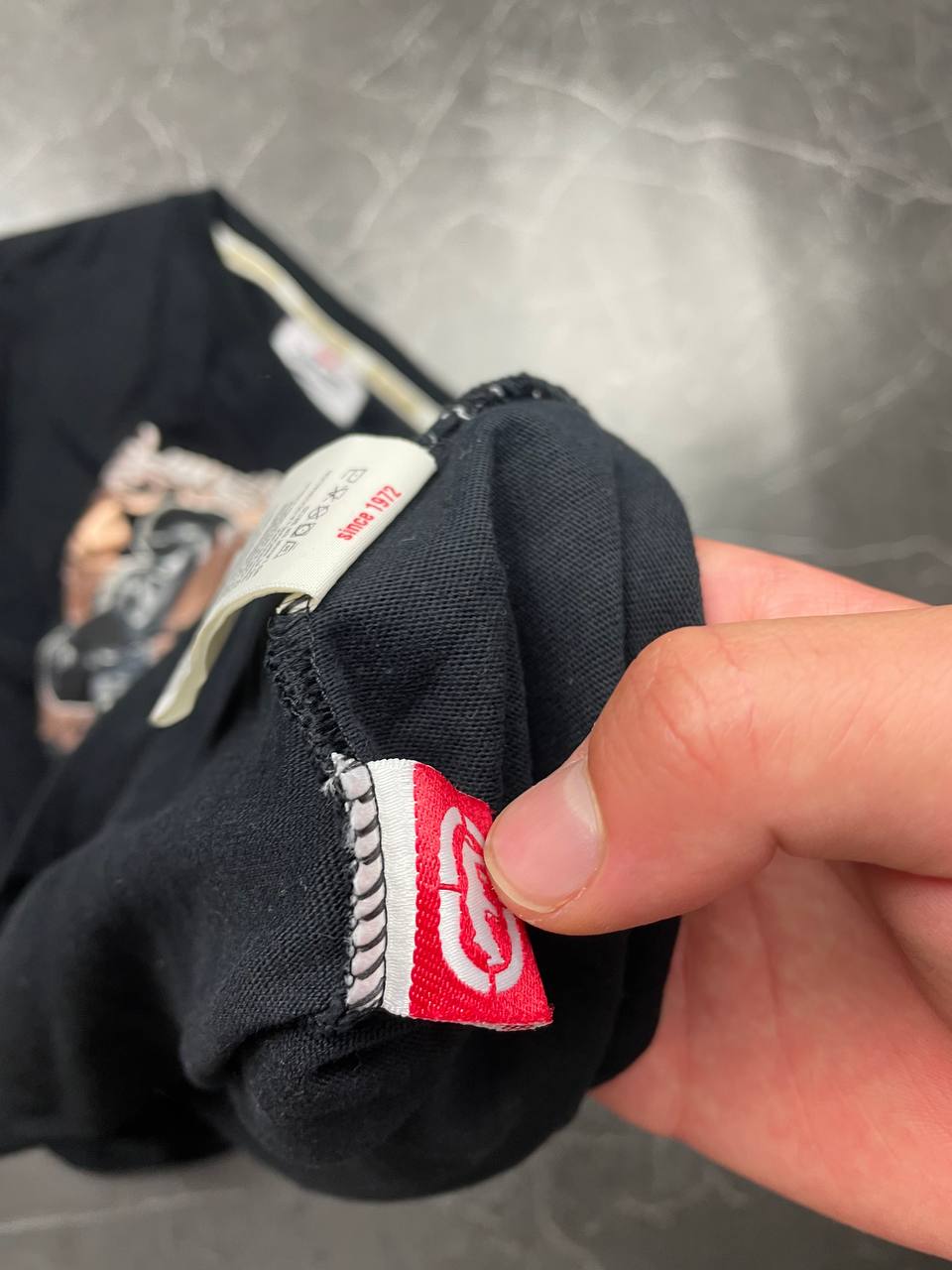 Ecko Unltd black graphic t-shirt featuring Jam Master Jay tribute and embroidered logo tab.