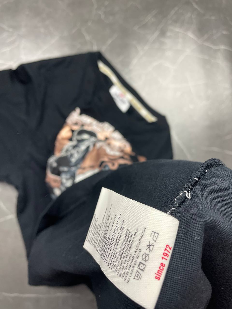 Ecko Unltd black graphic t-shirt featuring Jam Master Jay tribute and embroidered logo tab.