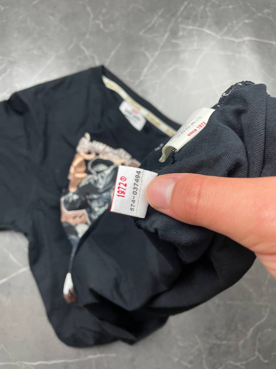 Ecko Unltd black graphic t-shirt featuring Jam Master Jay tribute and embroidered logo tab.