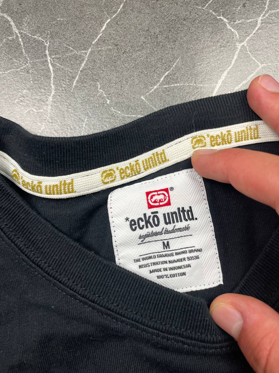 Ecko Unltd black graphic t-shirt featuring Jam Master Jay tribute and embroidered logo tab.