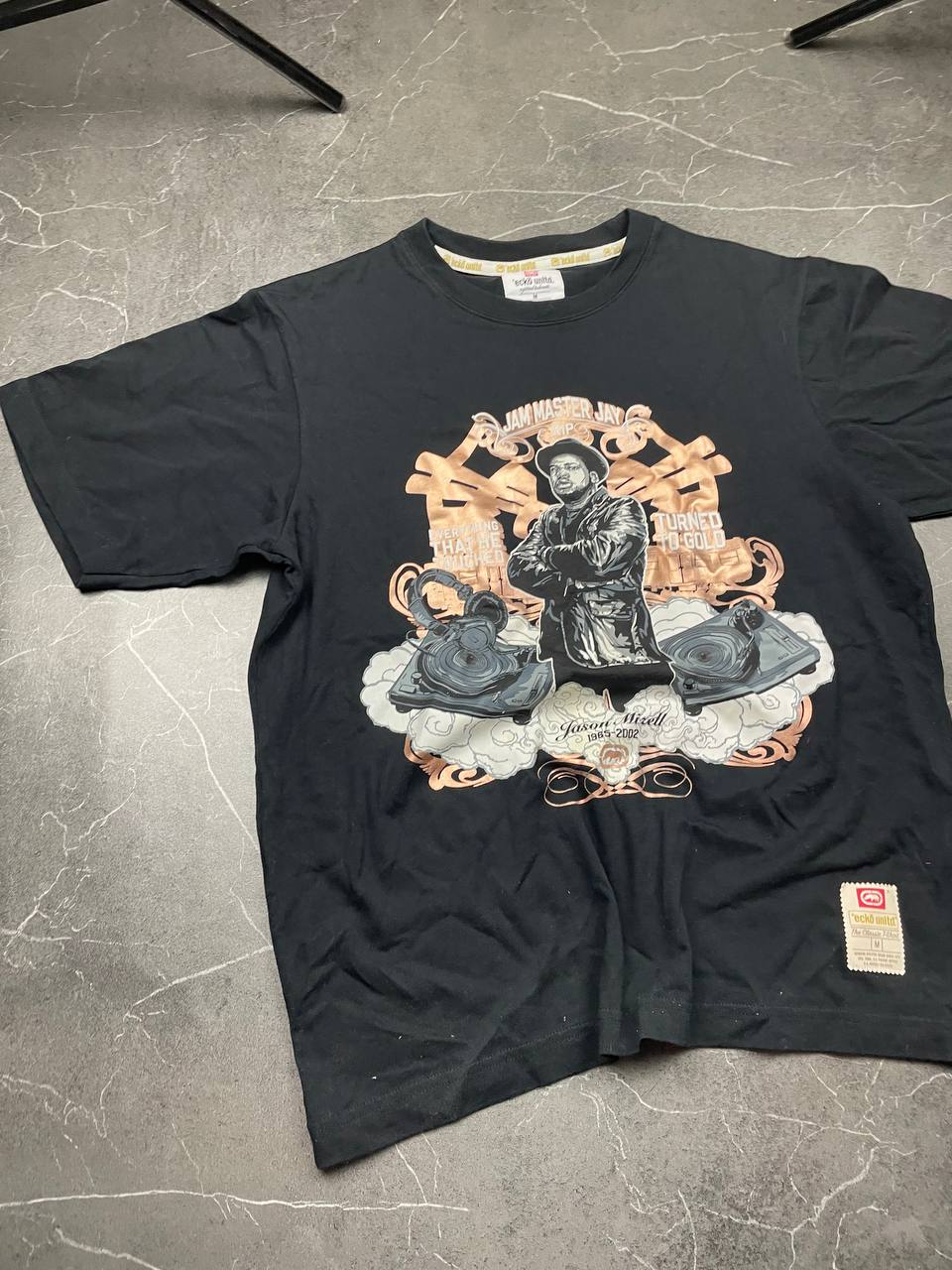 Ecko Unltd black graphic t-shirt featuring Jam Master Jay tribute and embroidered logo tab.