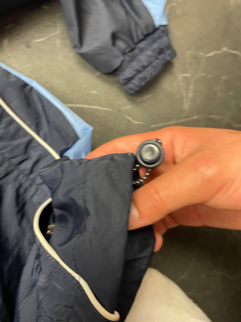 Adidas girls tracksuit navy blue with white stripes, full zip jacket and elastic pants.