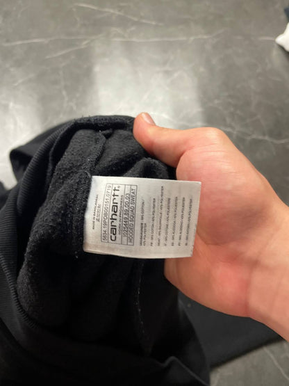 Carhartt black hooded sweatshirt small embroidered logo and front kangaroo pocket.