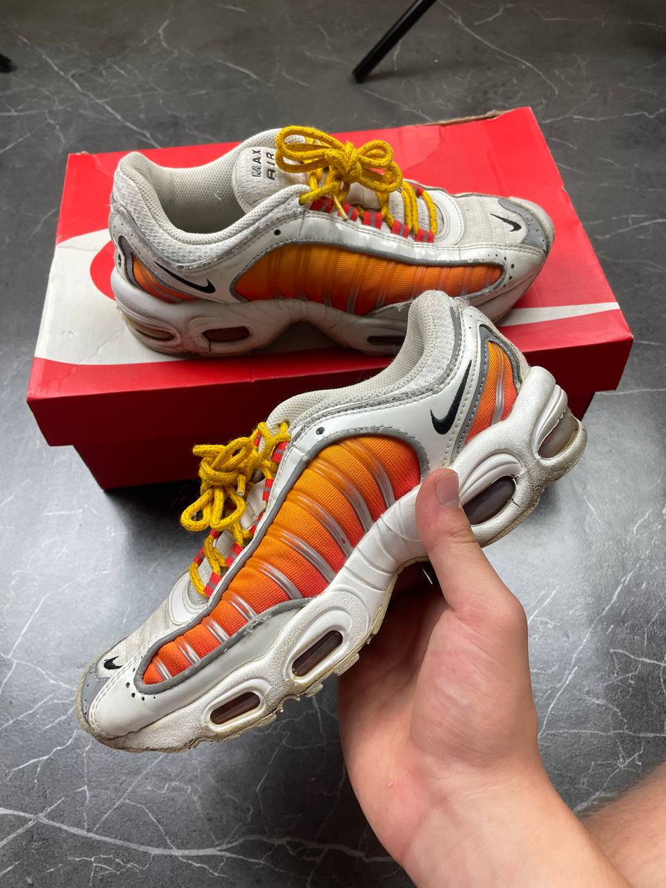Nike Air Max Tailwind IV sneakers white base orange side panels yellow laces red eyelets