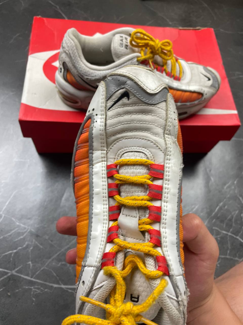 Nike Air Max Tailwind IV sneakers white base orange side panels yellow laces red eyelets