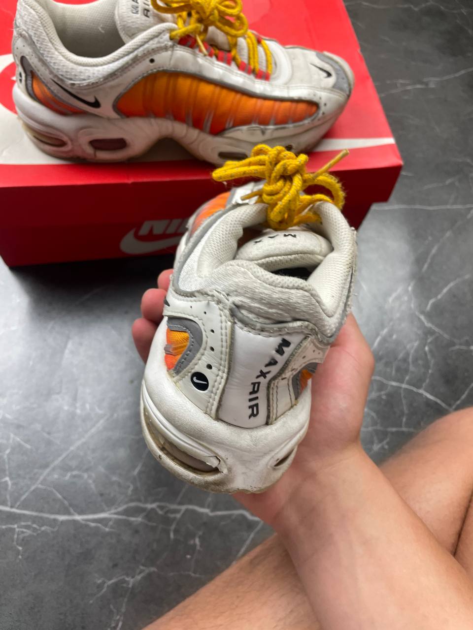 Nike Air Max Tailwind IV sneakers white base orange side panels yellow laces red eyelets