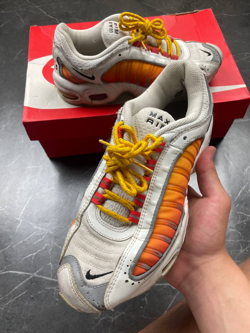 Nike Air Max Tailwind IV sneakers white base orange side panels yellow laces red eyelets
