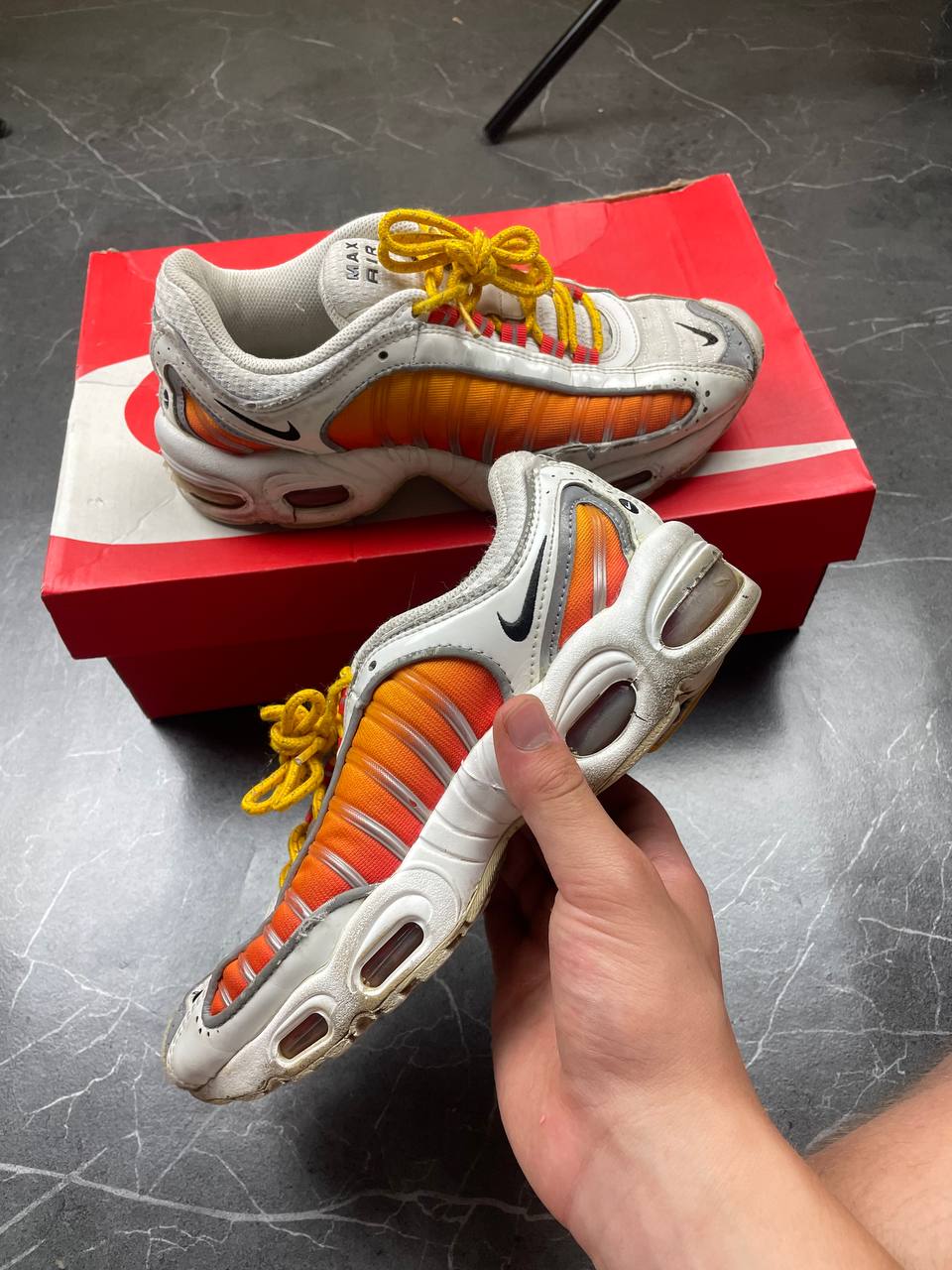 Nike Air Max Tailwind IV sneakers white base orange side panels yellow laces red eyelets