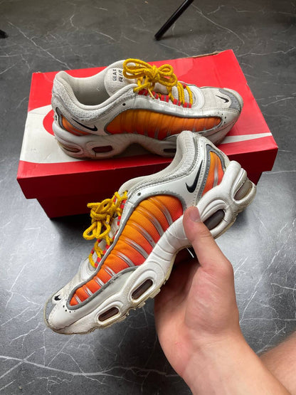 Nike Air Max Tailwind IV sneakers white base orange side panels yellow laces red eyelets