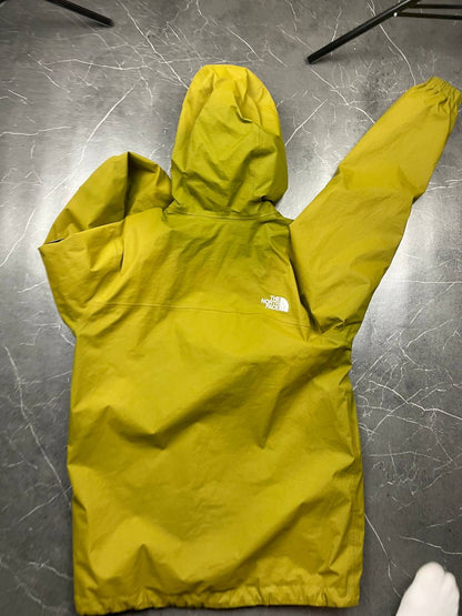 The North Face green hooded windbreaker jacket with branded patch and full zip front.