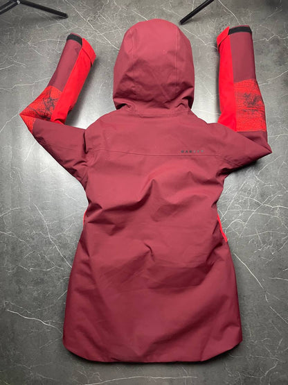 Oakley burgundy and red waterproof jacket with patterned accents and adjustable hood.