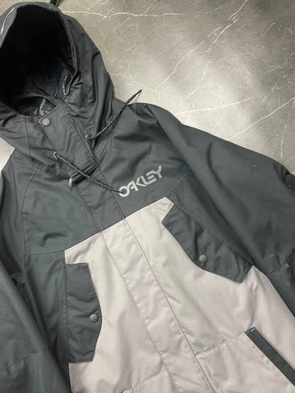 Oakley insulated hooded jacket black and grey with logo on chest and hood.