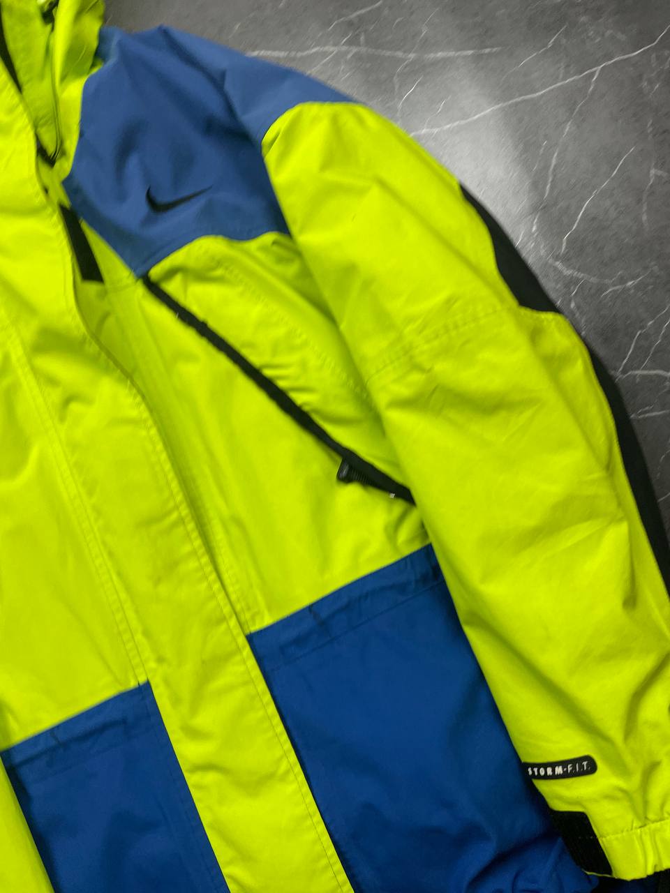 Nike ACG hooded jacket blue and neon green colour block design, Gore-Tex material.