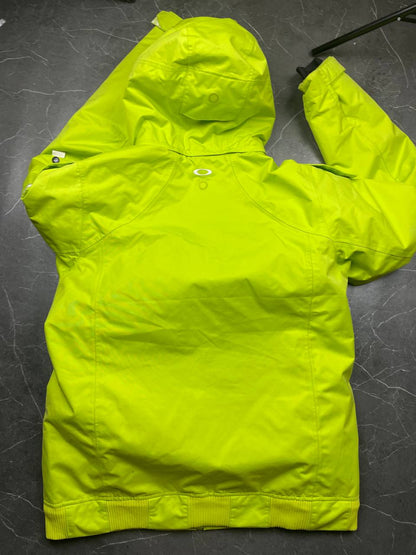 Oakley lime green ski jacket with hood, multicolored interior lining, logo on chest.