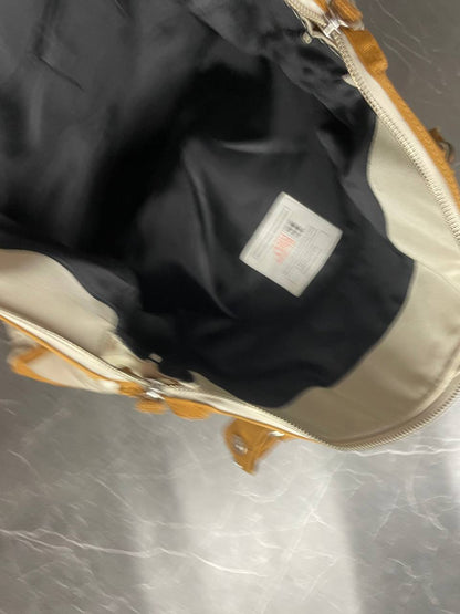 George Gina & Lucy beige canvas shoulder bag with brown straps and embroidered logo.