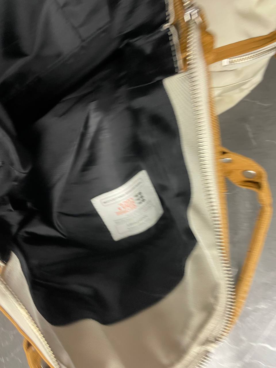 George Gina & Lucy beige canvas shoulder bag with brown straps and embroidered logo.