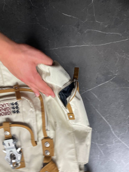 George Gina & Lucy beige canvas shoulder bag with brown straps and embroidered logo.