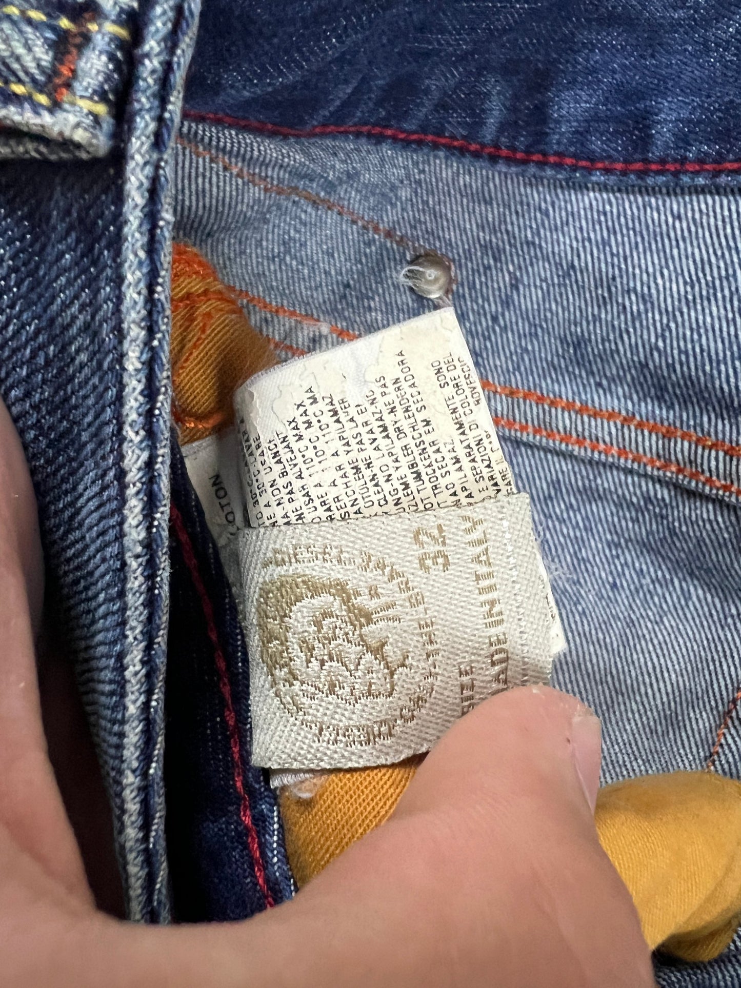 & Other Stories blue denim mini skirt with frayed hem and branded button fly closure